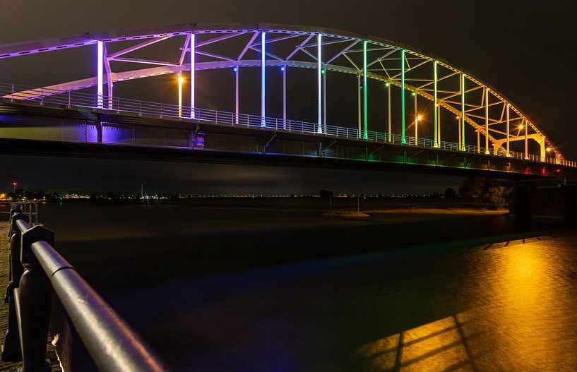 Deventer Wilhelmina Bridge in rainbow colors for Coming Out Day by VOSbeeld fotografie