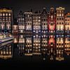 Amsterdam Damrak dans la soirée sur Johan Honders