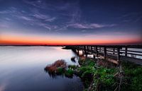 Wooden bridge to sunset