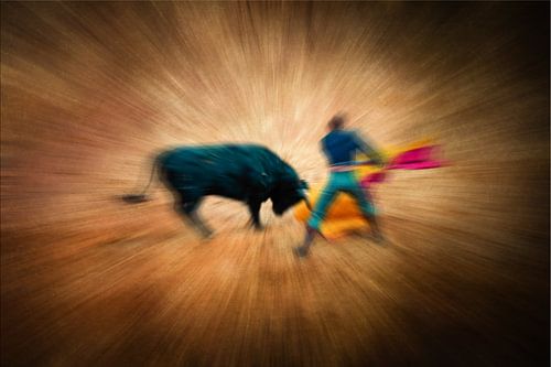 Abstract multiple exposure with blur bullfight bull and matador in Spain