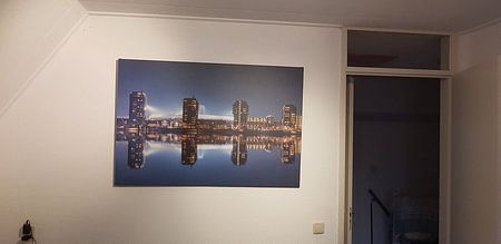 Rotterdam's Feijenoord Stadium in reflection