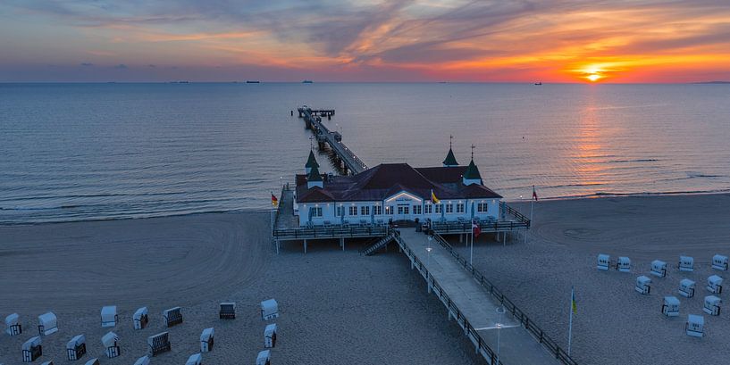 Pier on Ahlbeck beach at sunrise by Markus Lange