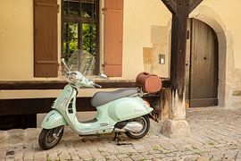 Mint green scooter in front of an old building in Germany - street and travel photography. by Christa Stroo photography