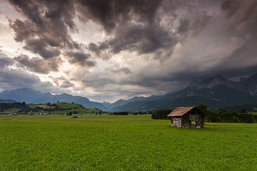 Rainclouds above Saalfelden van Harold van den Berge