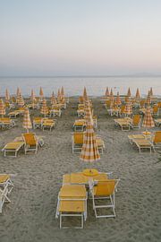 Follonica beach with yellow parasols by Eleana Tollenaar