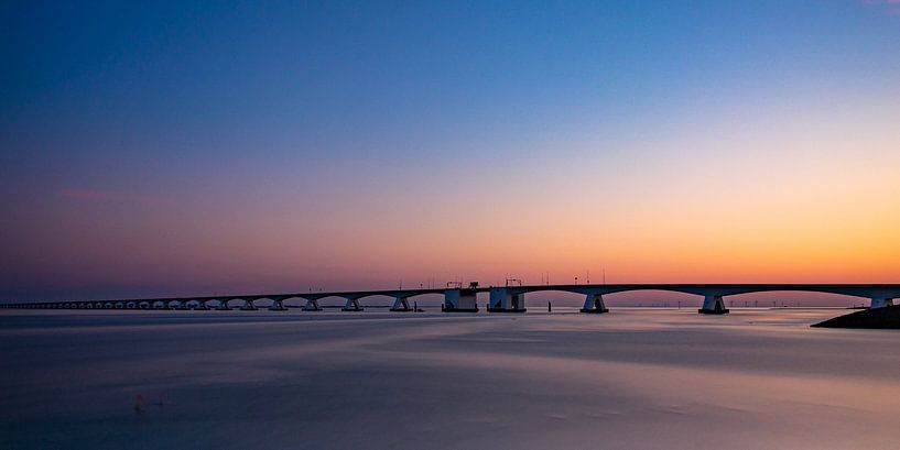 Sea sand bridge at sunset by Arthur Scheltes