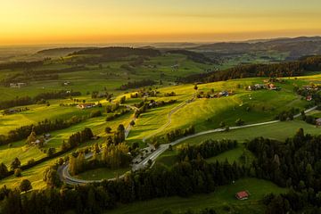 Rolling green hill in the last light of day