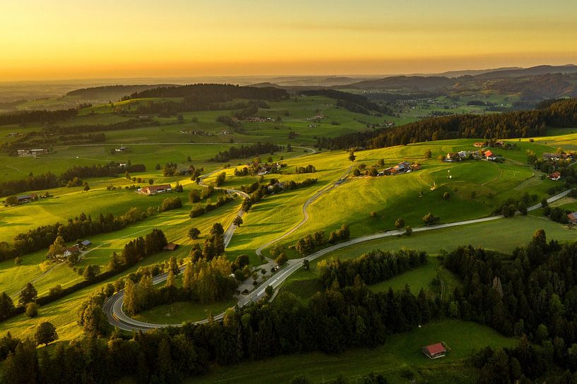 Rolling green hill in the last light of day by Jack Soffers