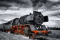 Steam locomotive in black white and red