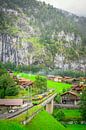 Yellow Flash: Train journey through Lauterbrunnens Natural Beauty by Bart Ros thumbnail