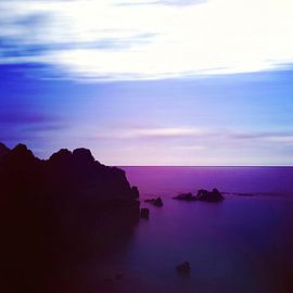 The calm, crimson sea at dusk – long exposure by Dirk Wüstenhagen
