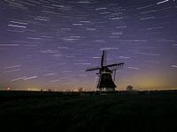 Mill in the night! with great starting rail in the background