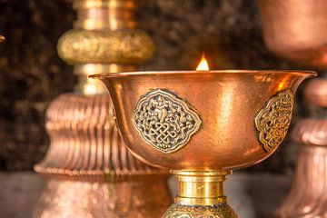 copper candlesticks at Thiksey monastery in Ladakh, India by Jan Fritz