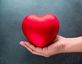 Rood hart met hand
