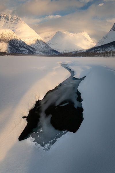 Winter soft light on the mountains in Tamokdalen, Norway. by Jos Pannekoek
