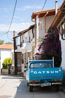 Greek street with a nice old blue Datsun