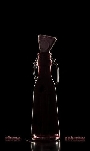 Silhouette of a bottle with creative touch