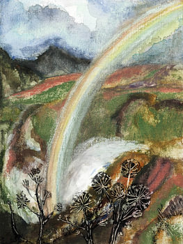 After the rain: Waterfall with rainbow in Iceland