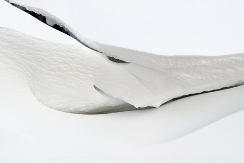 Snow sculpture made by the wind