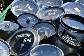 Old speedometers at the flea market by Ingo Laue