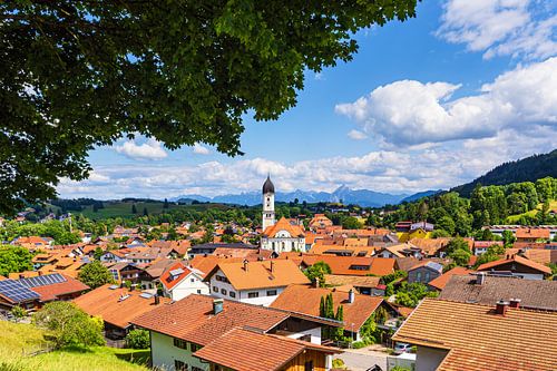 View of Nesselwang with church in the Allgäu by Rico Ködder