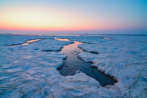 Arctic ice and sea landscape on the sand flats in the Waddensea  by Sjoerd van der Wal Photography