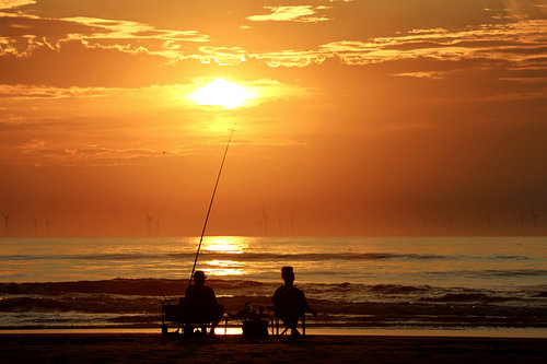 Pêche au coucher du soleil