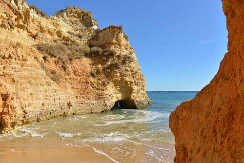 A glowing rock formation at Praia do Pinhão in Lagos – Algarve