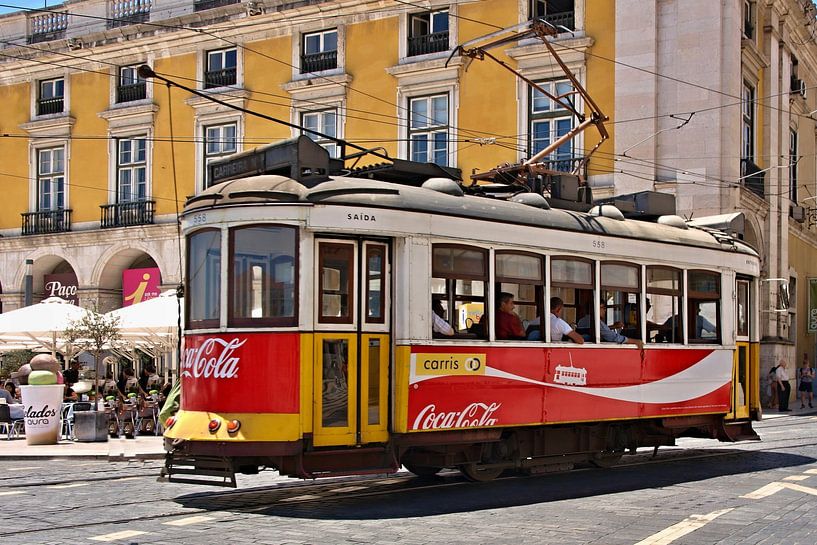 Red Coca Cola tram in Lisbon, Portugal by insideportugal