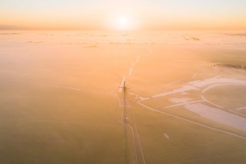 Poldermolen de Koningslaagte bij Zonsopkomst