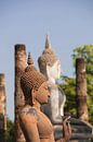 Boeddhabeelden in Sukkothai van Peter Baier thumbnail