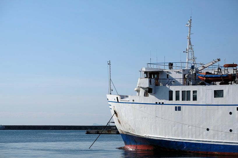 Ship in Lisbon harbour against a blue sky by Lensw0rld