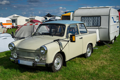 Vintage Trabant 601 with a camping caravan from the former GDR