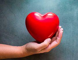 Rood hart met hand