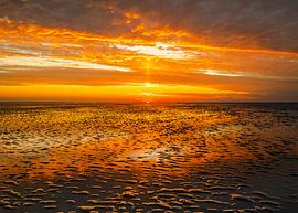 Lever du soleil sur le Wadden sur Willemijn Wolthaus