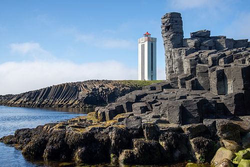 basalt columns and lighthouse in Kálfshamarsvik, Iceland by Jan Fritz