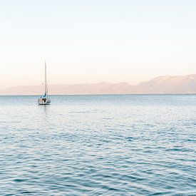 Boat at sunset in Greek sea - travel photography - Fine art photography by Kaylee Burger