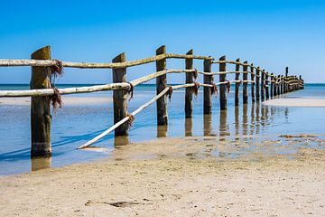 Fence on shore of the Baltic Sea by Rico Ködder