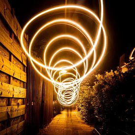 Moving warm light, high shutter speed (light art) by Jeffrey Steenbergen