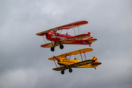 Classic biplanes in formation by Tiny Jegerings