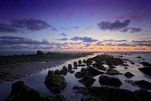 Rock in the surf by gaps photography