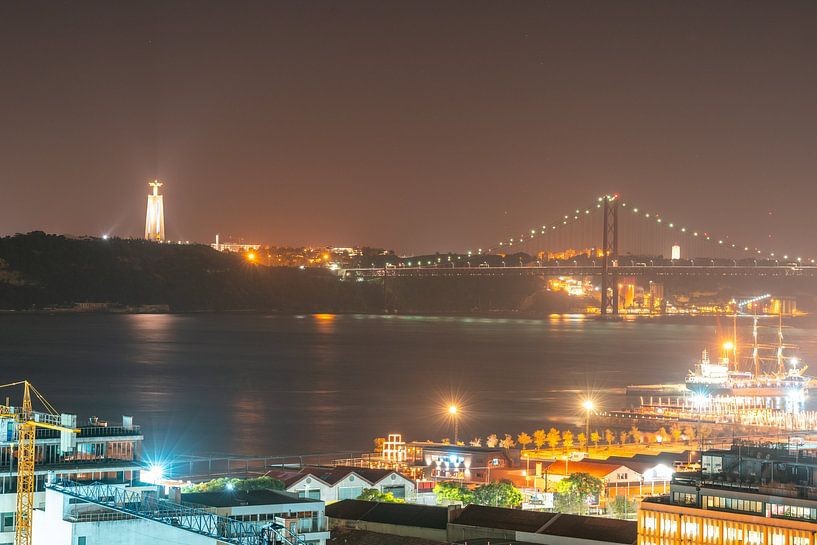 Lisbon's cityscape with harbour and bridge by Leo Schindzielorz