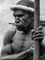 Man carries spear
