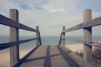 houten trap naar het strand