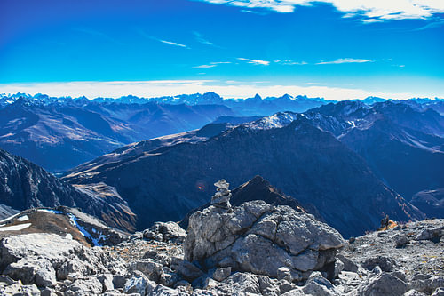 Little stone man above the mountains of Davos