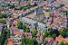 Photo aérienne de Sint Janskerk et de l'hôtel de ville, Gouda sur Anton de Zeeuw
