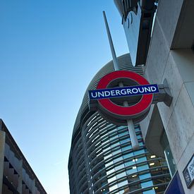 At this place is the entrance to the underground subway to travel in london by Rene du Chatenier
