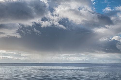 Cloudy sky above the Wadden Sea near Roptazijl