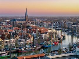 Pastellabend über dem Hafen von Harlingen von Thomas Röell