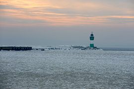 Lighthouse of Sassnitz at frozen Baltic Sea